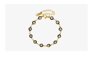 Dettaglio del bracciale occhio greco in oro 18K con chiusura a moschettone e marchio K18