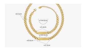 Detail of 18k gold plated Cuban chain set with polished rectangular ID tag and lobster clasp