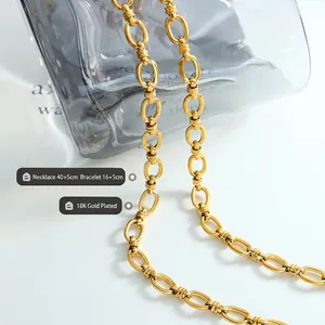 Ensemble bijoux collier et bracelet à grosses mailles dorées 18 carats avec liens ovales