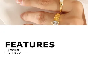 Detail of gold-plated ring set featuring a pearl band and oval zircon gemstone