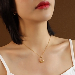 Vintage 18K gold plated titanium necklace with irregular hollow liquid metal pendant