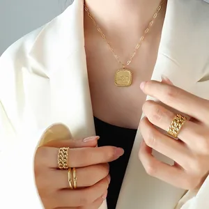 Minimalist 18K gold plated necklace with square relief pendant and matching gold ring set