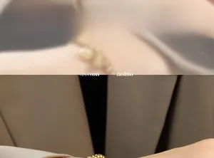 Ethnic style lotus pendant bracelet in 18K gold plated titanium steel on model wrist