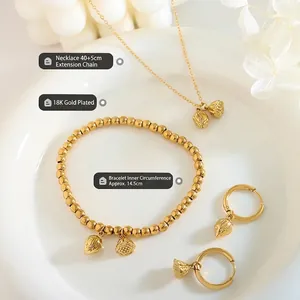 18K gold plated jewelry set featuring realistic lotus seed pod and bud pendant designs