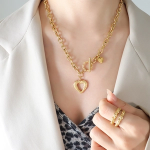 French style chunky chain necklace with heart pendant and textured rings in gold finish