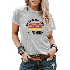 Detail of grey crewneck T-shirt featuring Bring On The Sunshine graphic with palm trees
