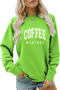 Detailed view of COFFEE WEATHER print on a bright green crewneck sweatshirt