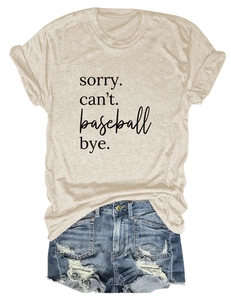 Flat lay of an apricot T-shirt with baseball text print and distressed denim shorts