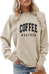 Detail of COFFEE WEATHER black letter print on apricot crewneck sweatshirt fabric