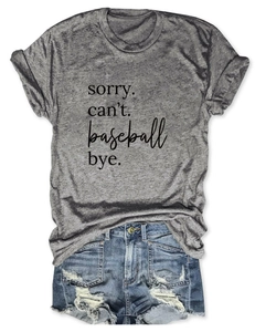 Close-up of sorry can't baseball bye text print on grey cotton t-shirt and denim shorts