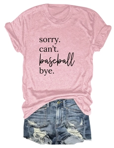 Pink t-shirt with sorry can't baseball print paired with ripped denim shorts