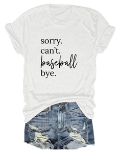 Flat lay of women's white t-shirt with sorry can't baseball text and denim shorts