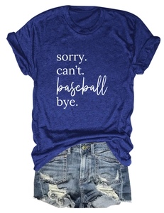 Flat lay of navy cotton T-shirt with 'sorry can't baseball' print and ripped denim shorts