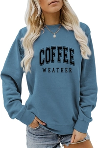 Detail of Coffee Weather print on blue crewneck sweatshirt with ribbed cuffs and hem