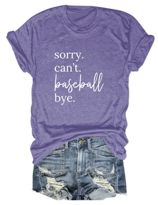 Detail of Sorry Can't Baseball print on purple t-shirt with distressed denim shorts