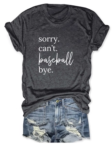 Detail of Sorry Can't Baseball print on charcoal t-shirt and ripped denim shorts