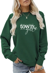 Detail of ribbed cuffs and Just a Small Town Girl print on dark green sweatshirt