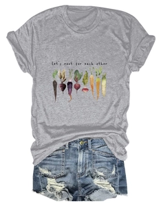 Flat lay of gray cotton t-shirt with vegetable prints and ripped denim shorts set