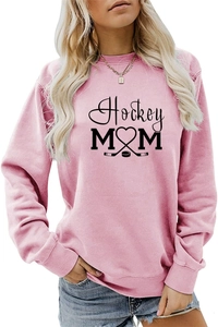 Detail of Hockey MOM print with sticks and heart on a pink long sleeve sweatshirt