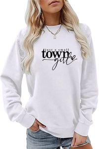 Detail of just a small town girl slogan and heart print on a white crewneck sweatshirt