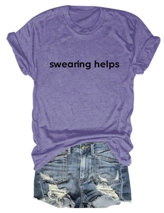 Detail of purple cotton T-shirt with 'swearing helps' print and distressed denim shorts