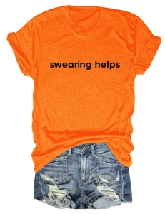Detail of orange t-shirt with swearing helps slogan and distressed denim shorts