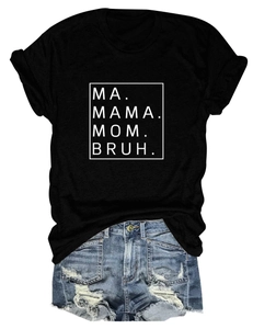 Detail of black cotton T-shirt featuring MA MAMA MOM BRUH print with ripped denim shorts