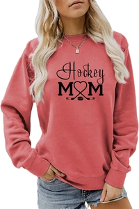 Close-up of brick red sweatshirt featuring black Hockey MOM print and crossed sticks