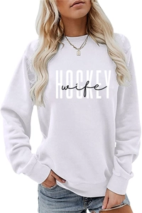 Detailed close-up of Hockey Wife letter print on a white crewneck sweatshirt