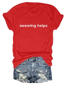 Detail of red T-shirt with 'swearing helps' print and distressed denim shorts