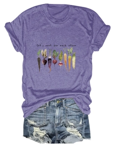 Close-up of a purple cotton t-shirt with vegetable illustration and distressed denim shorts
