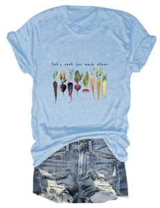Close-up of Let's Root For Each Other slogan and vegetable print on light blue cotton T-shirt