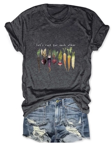 Detail of Let's root for each other t-shirt with colorful vegetable graphic print