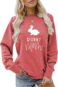 Detailed view of white bunny silhouette and Bunny Mom script on pink sweatshirt