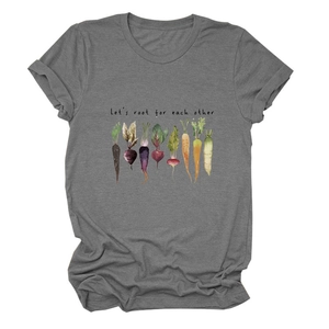 Detailed flat lay of a grey t-shirt featuring vegetable graphics and inspiring slogan