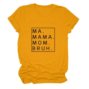 Detail of rolled cuffs and black text print on mustard yellow loose short sleeve T-shirt