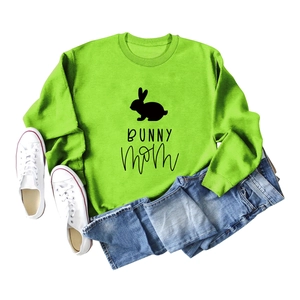 Flat lay of neon green sweatshirt featuring black bunny silhouette and Bunny Mom text