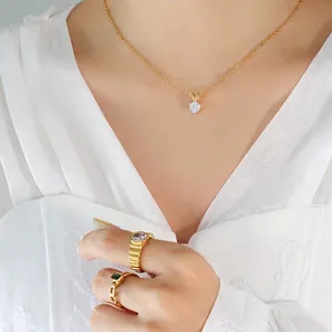 Elegant 18K gold plated titanium necklace and rings set with sparkling zircon stones