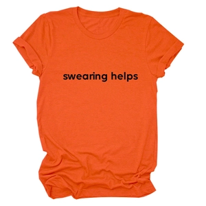 Detail of orange cotton T-shirt featuring black swearing helps graphic print