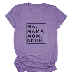 Close-up of purple t-shirt fabric and MA MAMA MOM BRUH artistic graphic lettering print