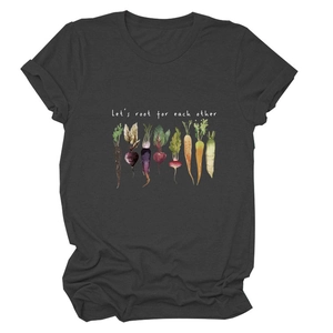 Macro shot of cotton T-shirt fabric with watercolor vegetable print and motivational text
