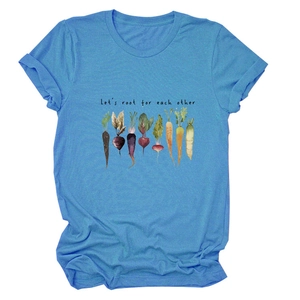 Detail of Let's root for each other slogan and vegetable graphics on blue cotton t-shirt