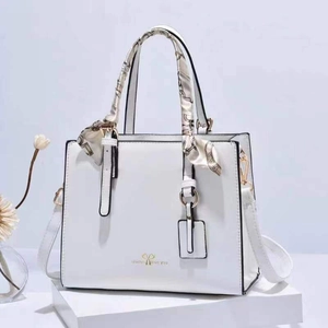 Elegant white PU leather handbag with silk scarf handle and adjustable shoulder strap