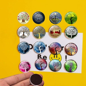 Set of 16 tree of life glass refrigerator magnets with strong magnetic back on yellow background