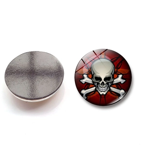 Front and back view of a 25mm skull crystal glass fridge magnet with magnetic backing