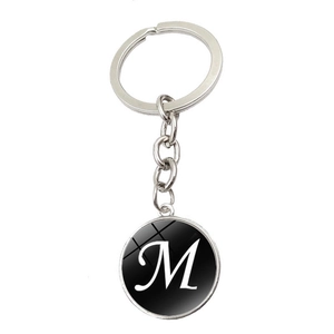 Porte-clés en métal argenté avec pendentif noir, lettre M artistique et dôme en verre