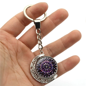 Silver crescent moon keychain with purple Notre Dame stained glass mandala pendant