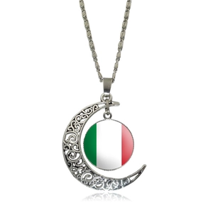 Detail of silver hollow moon pendant featuring an Italian flag pattern on a white background