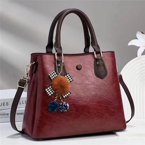 Vintage burgundy PU leather handbag with houndstooth bow and colorful pompom charms