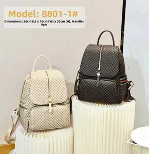 Detailed view of large travel backpacks with quilted texture and 26x18x32cm dimensions